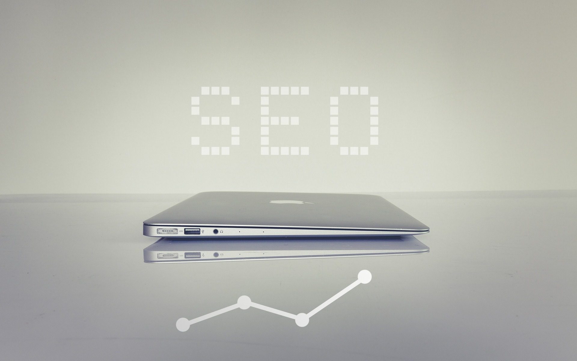 SEO above closed apple laptop