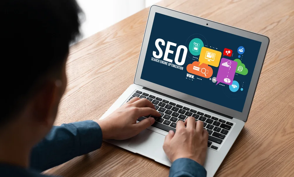 Man relaxing knowing hes chosen the best seo company for his business