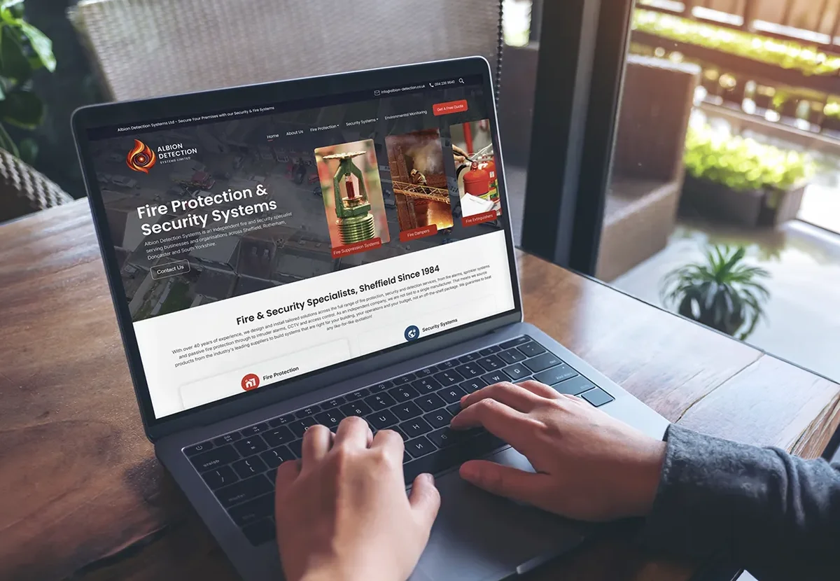 Website redesign for Albion Detection Systems shown on a laptop